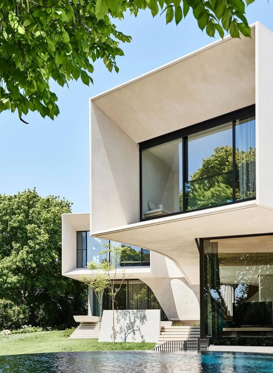 Contemporary villa with full-height black aluminium windows