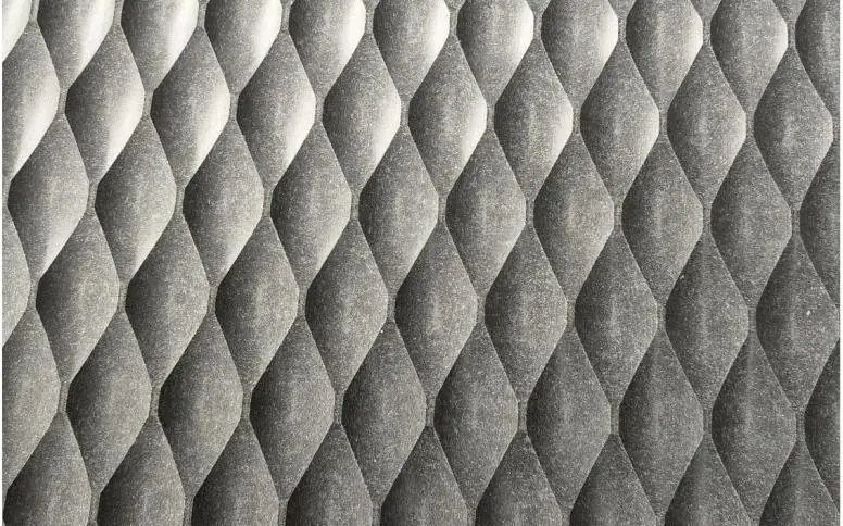 Diamond quilt carved fibre cement panel