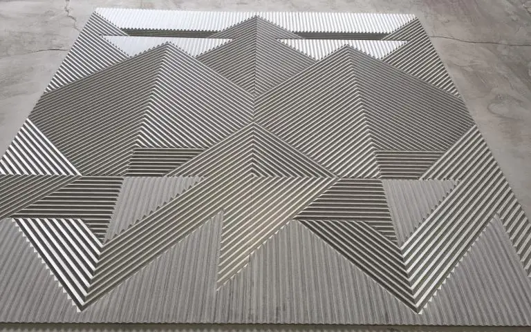 Faceted prism fibre cement panel