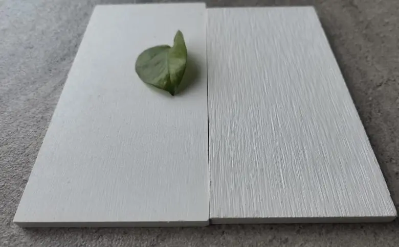 White fibre cement boards, sand and brushed finish