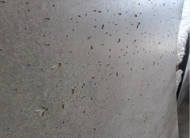Mid grey travertine-look fibre cement panel